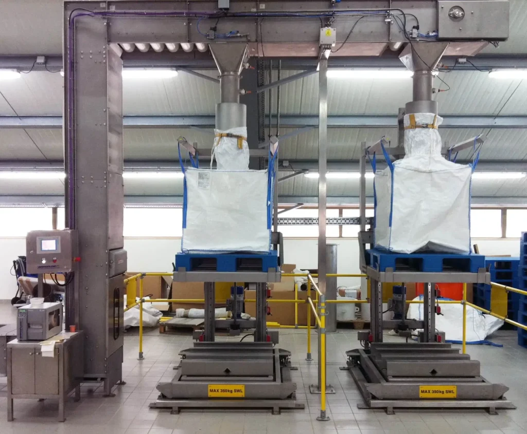 The bulk bag fillers in the "rise" position
