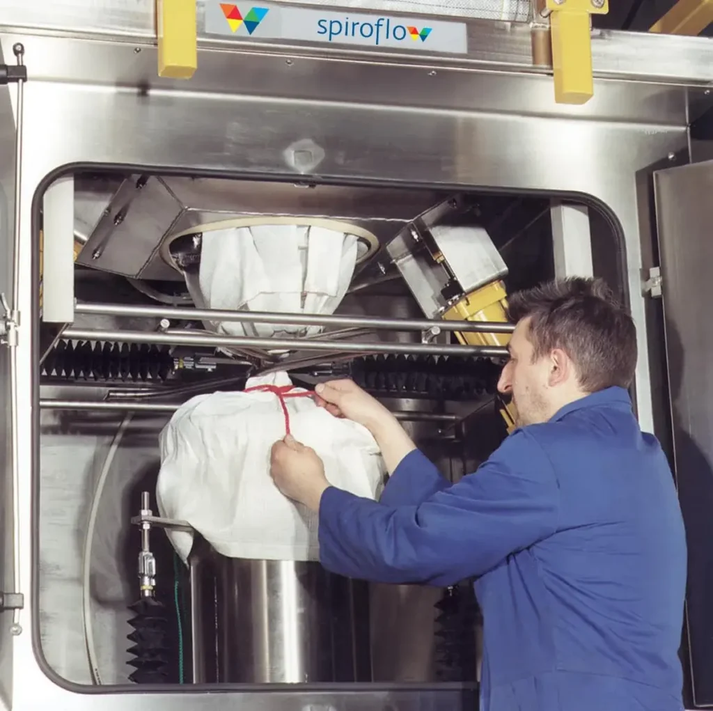 A man untying a bag sprouts