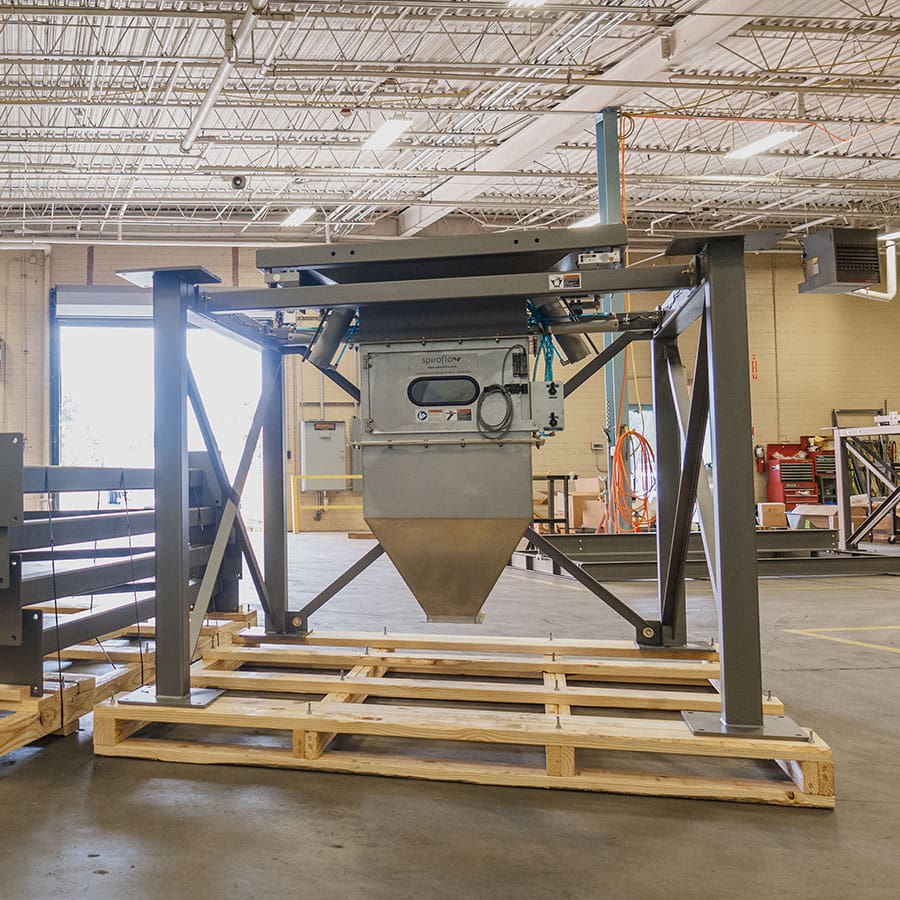 A bulk bag unloader in a production facility